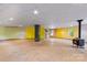 Open basement area with storage and a spiral staircase at 241 Spring Shore Rd, Statesville, NC 28677