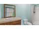 Clean bathroom with vanity, toilet and shower at 241 Spring Shore Rd, Statesville, NC 28677