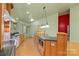 Open kitchen with island and breakfast bar, perfect for entertaining at 241 Spring Shore Rd, Statesville, NC 28677
