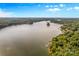 Aerial view of waterfront property with lake access and lush green landscape at 241 Spring Shore Rd, Statesville, NC 28677