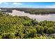 Aerial view showing property near lake and wooded area at 241 Spring Shore Rd, Statesville, NC 28677