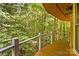 Private deck overlooking a lush wooded area at 241 Spring Shore Rd, Statesville, NC 28677