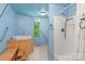 Clean bathroom with a shower/tub combo and updated fixtures at 241 Spring Shore Rd, Statesville, NC 28677