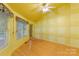 Charming bedroom with hardwood floors and large windows at 241 Spring Shore Rd, Statesville, NC 28677