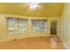 Bright bedroom with hardwood floors and access to a deck at 241 Spring Shore Rd, Statesville, NC 28677