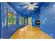 Spacious living room with hardwood floors, fireplace, and large windows at 241 Spring Shore Rd, Statesville, NC 28677