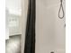 Bathroom with shower stall and dark shower curtain at 6609 Highbrook Dr, Charlotte, NC 28212