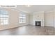 Living room with fireplace and hardwood floors at 5108 Silver Creek Ln, Denver, NC 28037