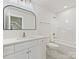 Clean, white bathroom with gold fixtures and a modern arched mirror at 1467 Centennial Dr, Rock Hill, SC 29732