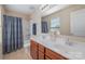 Bathroom with double vanity and shower/tub at 4243 Houldsworth Dr, Charlotte, NC 28213