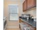 Laundry room with washer, dryer, and folding counter at 4243 Houldsworth Dr, Charlotte, NC 28213