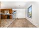 Kitchen with wood cabinets, tiled floor and access to backyard at 316 W Sandy Ridge Rd, Monroe, NC 28112