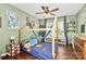 bedroom with a unique bed, shelving, and playful decor at 1001 Serel Dr, Matthews, NC 28104