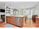 Island kitchen with granite countertop and stainless steel dishwasher at 1001 Serel Dr, Matthews, NC 28104