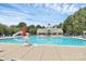 Community swimming pool with a clubhouse and ample space at 1001 Serel Dr, Matthews, NC 28104