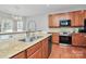 Kitchen with stainless steel appliances and granite counters at 1001 Serel Dr, Matthews, NC 28104
