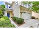 Inviting two-story home with a blue door and attached garage at 1001 Serel Dr, Matthews, NC 28104