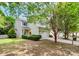 Two-story house with a charming facade, well-maintained lawn at 1001 Serel Dr, Matthews, NC 28104