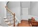 Bright entryway with hardwood floors and a staircase at 1001 Serel Dr, Matthews, NC 28104