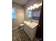 Bathroom with pedestal sink and updated vanity at 2650 31St Street Ne Ct, Hickory, NC 28601