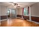 Dining room with hardwood floors, sliding glass door and window at 110 Hidden Valley St, Cherryville, NC 28021