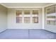 Screened porch with light colored flooring and multiple windows at 132 Brooke Forest Ct, Mooresville, NC 28115