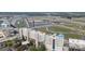 Aerial view showcasing a large race track and surrounding area at 4721 Morehead Rd # 409, Concord, NC 28027