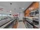 Modern kitchen with stainless steel appliances and granite countertops at 4721 Morehead Rd # 409, Concord, NC 28027