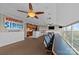 Open concept game room with kitchen and track views at 4721 Morehead Rd # 409, Concord, NC 28027