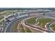 Aerial view showcasing the racetrack and surrounding area at 4721 Morehead Rd # 409, Concord, NC 28027