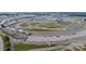 Aerial view of a large race track with various buildings at 4721 Morehead Rd # 409, Concord, NC 28027