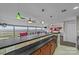 Stylish kitchen with dark countertops and wood cabinets at 4721 Morehead Rd # 409, Concord, NC 28027