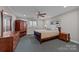 Bright bedroom with ample closet space and window at 4721 Morehead Rd # 409, Concord, NC 28027