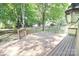 Spacious deck perfect for outdoor entertaining, surrounded by trees at 11334 Longhedge Ln, Charlotte, NC 28273