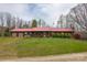 Ranch home with attached garage and red roof at 225 Frye Hts, Taylorsville, NC 28681