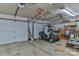 Spacious two-car garage with extra storage shelving and room for a golf cart at 225 Frye Hts, Taylorsville, NC 28681
