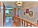 Hallway with wood flooring and view into kitchen at 225 Frye Hts, Taylorsville, NC 28681
