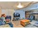 Finished basement with a large TV, and wooden coffee table at 225 Frye Hts, Taylorsville, NC 28681