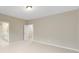 Spacious bedroom with access to bathroom and neutral decor at 213 E Warfield Dr, Mooresville, NC 28115
