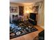 Living room with TV, rug, and comfortable seating at 5012 Sardis Rd # D, Charlotte, NC 28270