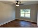 Bedroom with hardwood floors and a large window at 7809 Medlin Rd, Monroe, NC 28112