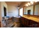 Bathroom featuring a soaking tub and double vanity at 1235 Bob Falls Dr, Shelby, NC 28150
