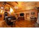Spacious living room with hardwood floors, a large sectional sofa, and a high ceiling at 1235 Bob Falls Dr, Shelby, NC 28150
