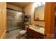 Bathroom with tub, shower, and granite countertop at 1235 Bob Falls Dr, Shelby, NC 28150