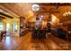 Open concept kitchen with island, hardwood floors, and vaulted ceiling at 1235 Bob Falls Dr, Shelby, NC 28150