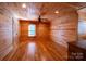 Simple bedroom with hardwood floors and a large window at 1235 Bob Falls Dr, Shelby, NC 28150