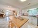 Kitchen with butcher block countertops and white shaker cabinets at 540 Harbor Rd, Norwood, NC 28128