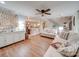 Bright living room showcasing hardwood floors and open concept to kitchen at 540 Harbor Rd, Norwood, NC 28128