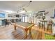 Finished basement with pool table and bar area at 540 Harbor Rd, Norwood, NC 28128