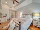 Main bedroom with king-size bed, and access to en-suite bathroom at 540 Harbor Rd, Norwood, NC 28128